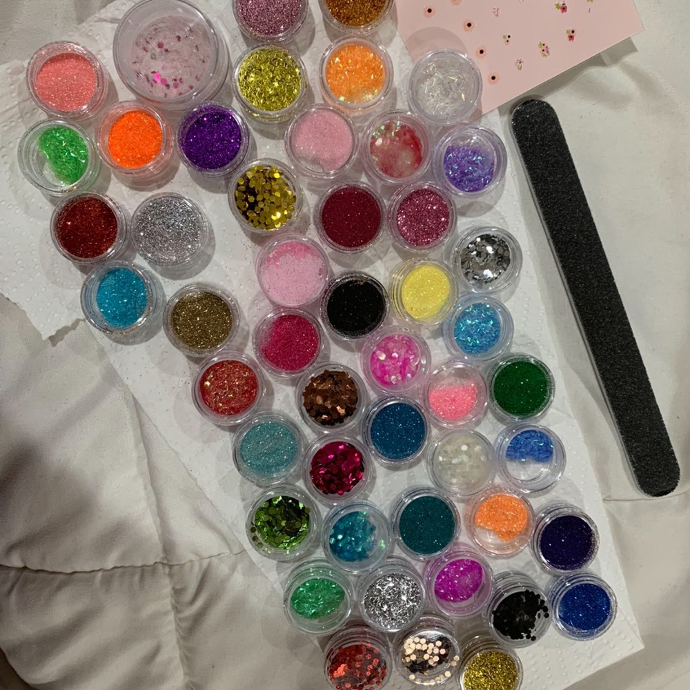 bunch of glitters also comes with nail stickers